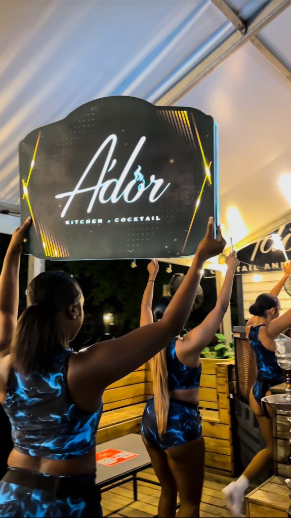 A'dor sign at night